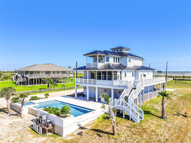 The home and 32,000 gallon saltwater pool blend seamlessly to create a true indoor outdoor lifestyle experience. Spend mornings on the balcony, afternoons poolside, and evenings enjoying breathtaking sunsets.