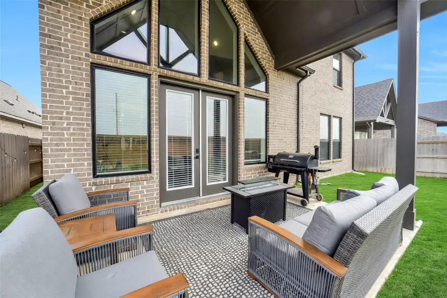 Exterior details and patio area of a home in Elyson 45' & 70', Cypress (Image 21).