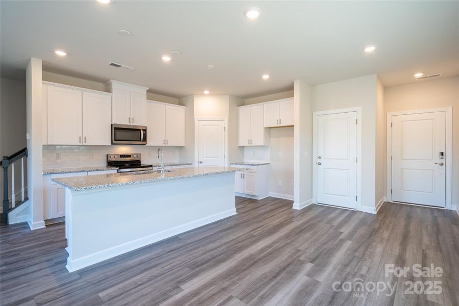 Photo is not of the actual home, but is an inspirational photo of builder’s model home and may depict options, furnishings, and/or decorator features that are not included Photo is not of the actual home, but is an inspirational photo of builder’s model home and may depict options, furnishings, and/or decorator features that are not included