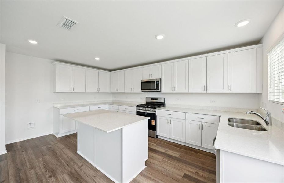 Airy kitchen with ample cabinet space