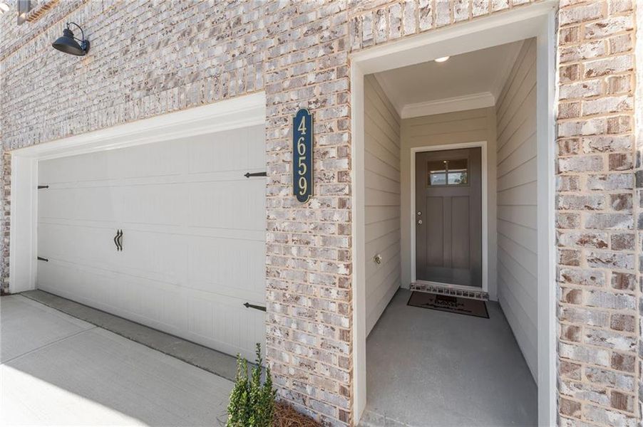 Exterior details and patio area of a home in Wildwood Place, Powder Springs (Image 3).