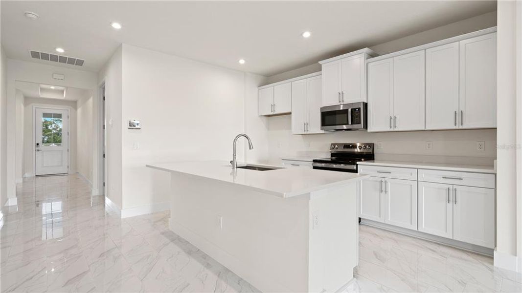 Furnished interior view inside a new home in Trailside, Mount Dora (Image 7).