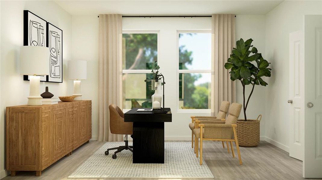 Living area with light hardwood / wood-style flooring