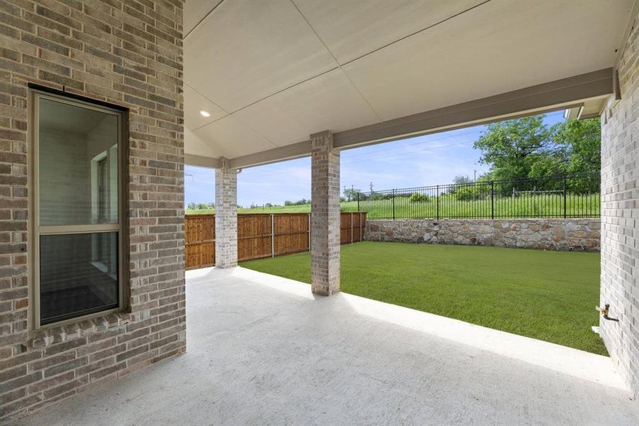 Exterior details and patio area of a home in Inspiration, Seis Lagos (Image 27). Exterior details and patio area of a home in Inspiration, Seis Lagos (Image 27).