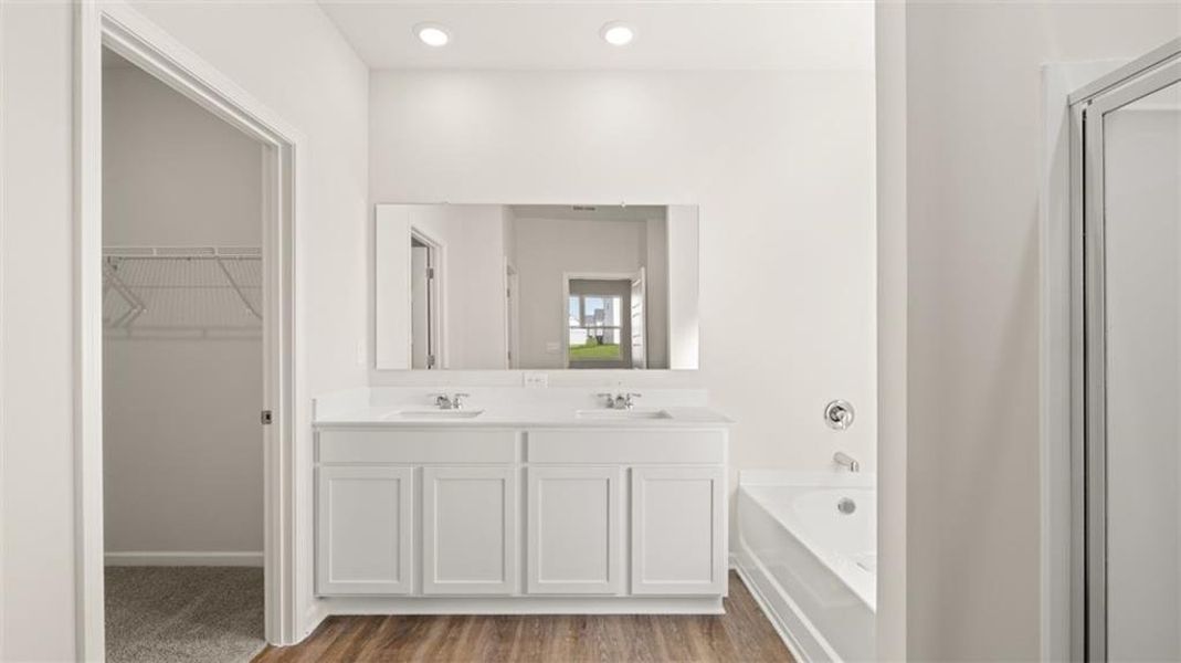 Furnished interior view inside a new home in The Preserve at Agricultural Village, Perry (Image 9).