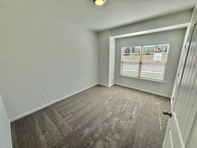 Spacious, unfurnished interior of a new home in Stone Fort Meadows, Manchester (Image 11).
