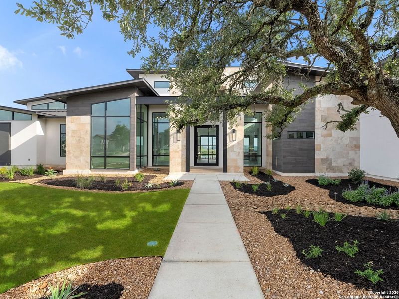 Front exterior of a new home in , Boerne, TX, highlighting curb appeal (Image 29).