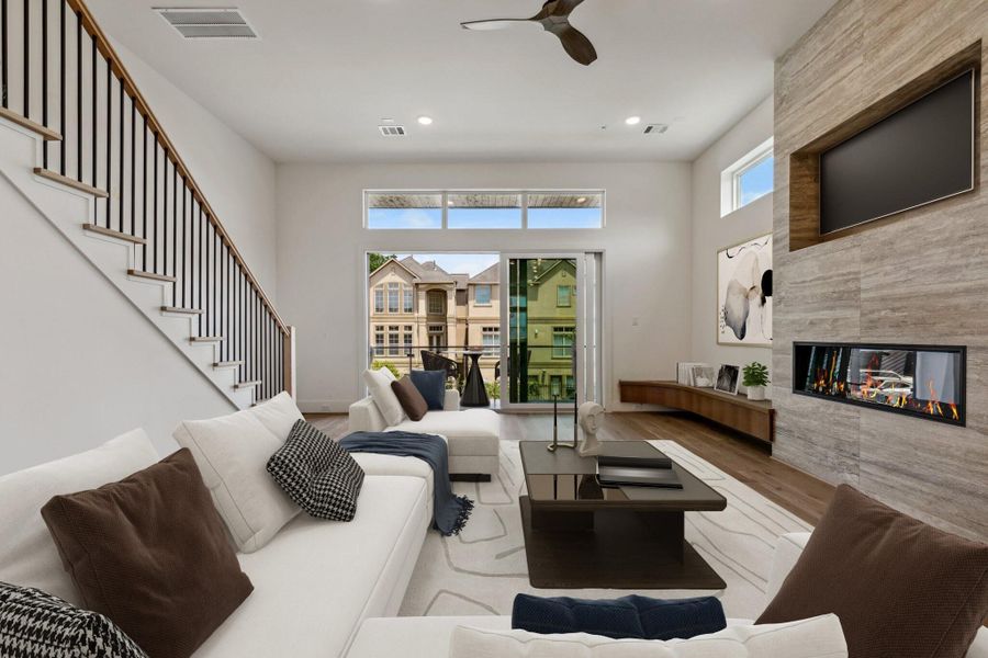Entertainment galore with large panel opening to balcony overlooking front yard. Virtually Staged.