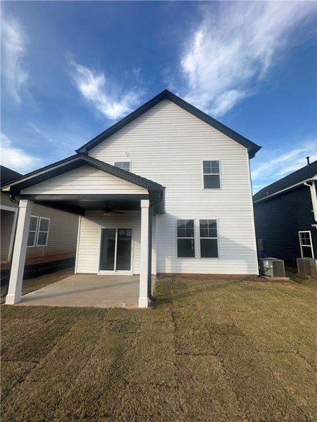 Exterior details and patio area of a home in Brownstone Park, Easley (Image 2).