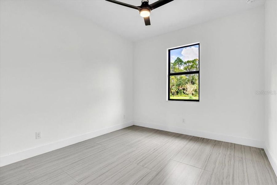 Spacious, unfurnished interior of a new home in , Port Charlotte (Image 31).