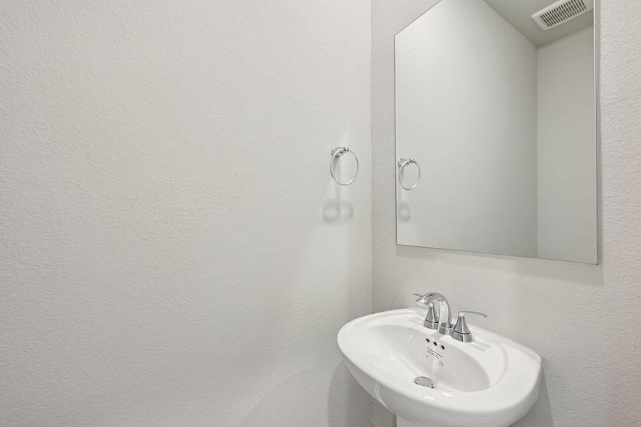 Close-up of interior finishes inside a home in Heights of Barbers Hill, Baytown (Image 22).