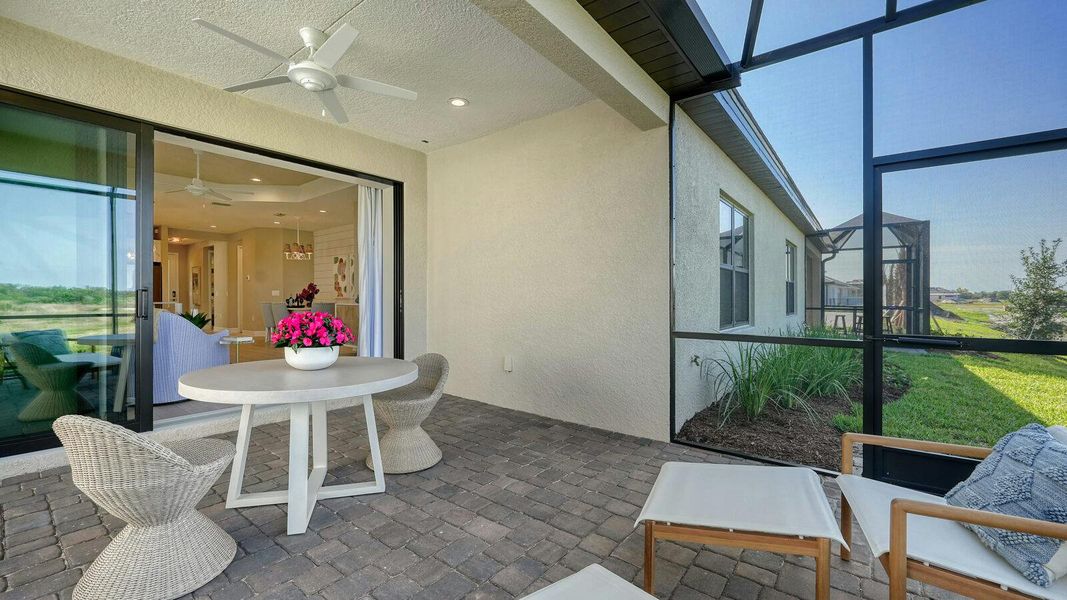 Exterior details and patio area of a home in Vistera of Venice Real Estate and Homes for Sale in Venice, FL - Neal Communities, Nokomis (Image 3). Exterior details and patio area of a home in Vistera of Venice Real Estate and Homes for Sale in Venice, FL - Neal Communities, Nokomis (Image 3).