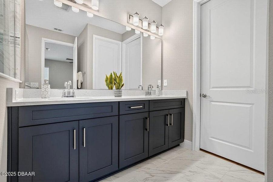 Furnished interior view inside a new home in Legends Preserve - Reserve Series, Daytona Beach (Image 14). Furnished interior view inside a new home in Legends Preserve - Reserve Series, Daytona Beach (Image 14).