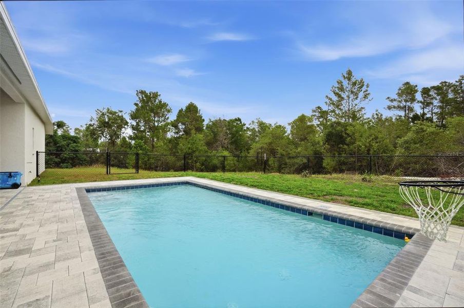 Exterior details and patio area of a home in , Weeki Wachee (Image 27).
