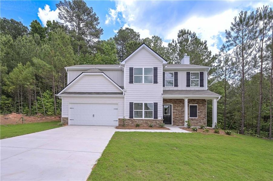Front exterior of a new home in , Villa Rica, GA, highlighting curb appeal (Image 2). Front exterior of a new home in , Villa Rica, GA, highlighting curb appeal (Image 2).