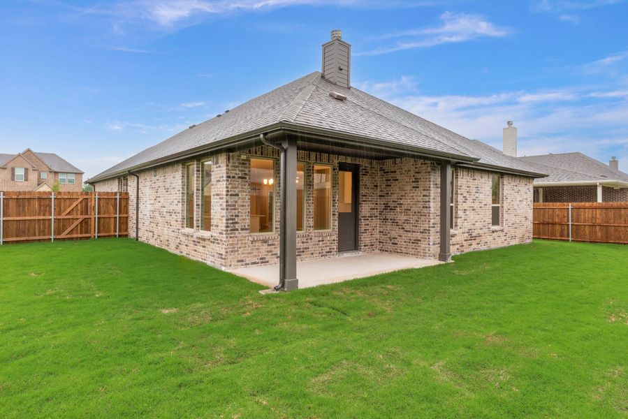 Exterior details and patio area of a home in Aero Vista, Caddo Mills (Image 3).