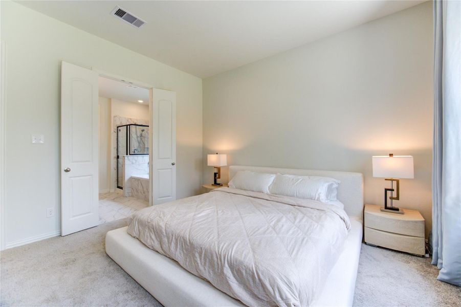 Primary Suite to relax and rejuvenate.