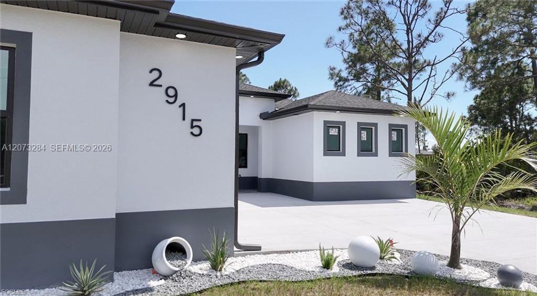 Exterior details and patio area of a home in , Lehigh Acres (Image 29).
