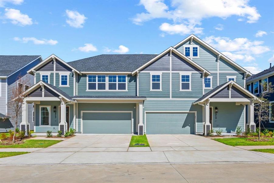 Front exterior of a new home in North Square at Uptown, Celina, TX, highlighting curb appeal (Image 2). Front exterior of a new home in North Square at Uptown, Celina, TX, highlighting curb appeal (Image 2).