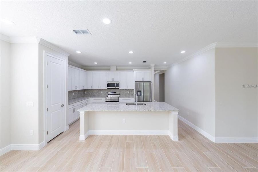 Furnished interior view inside a new home in , Summerfield (Image 7).