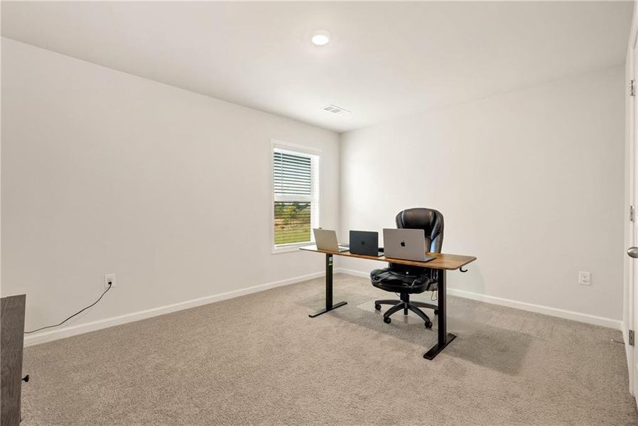 Furnished interior view inside a new home in , Cumming (Image 35).