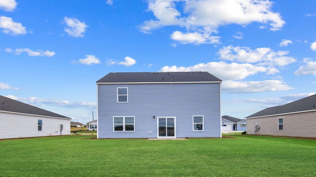 Exterior details and patio area of a home in Palm Ridge, Guyton (Image 3). Exterior details and patio area of a home in Palm Ridge, Guyton (Image 3).