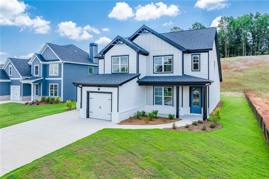 Front exterior of a new home in , Homer, GA, highlighting curb appeal (Image 18).