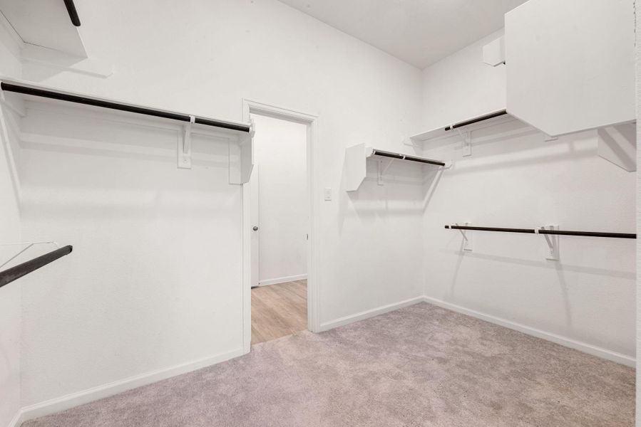 Spacious, unfurnished interior of a new home in Sunterra, Katy (Image 25).