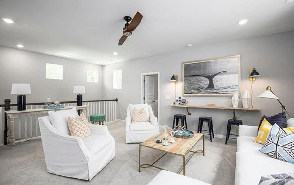 Furnished interior view inside a new home in Sweetgrass at Summers Corner, Summerville (Image 11).