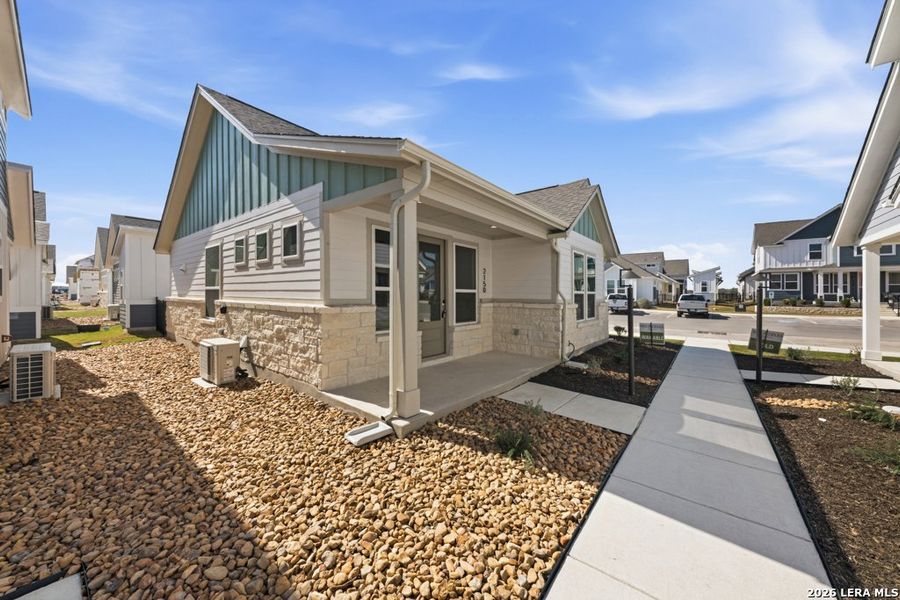 Exterior details and patio area of a home in , New Braunfels (Image 13).