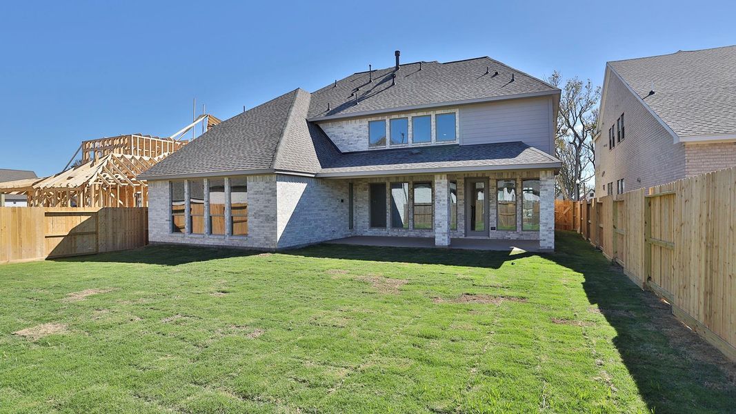 Exterior details and patio area of a home in Riceland 60', Mont Belvieu (Image 2). Exterior details and patio area of a home in Riceland 60', Mont Belvieu (Image 2).