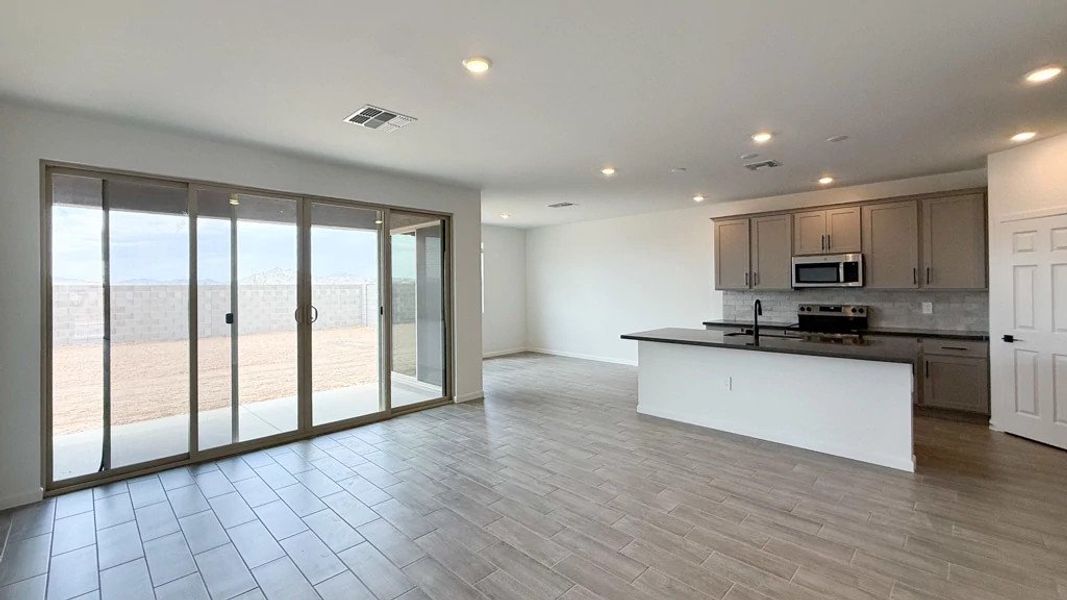Great room, kitchen and dining Great room, kitchen and dining