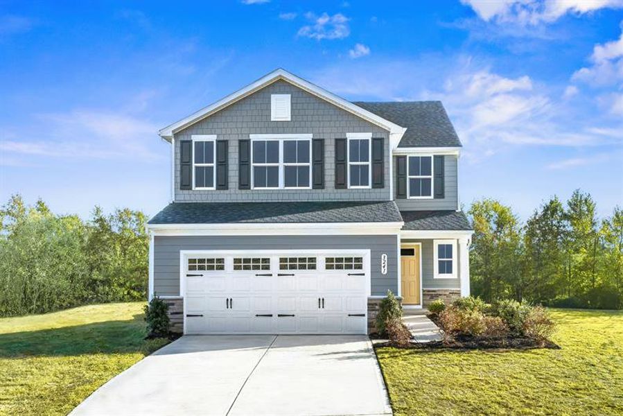 Representative exterior photo of a completed home built from the Woodford by Ryan Homes in Sterling Oaks, Ash, NC (Image 2).
