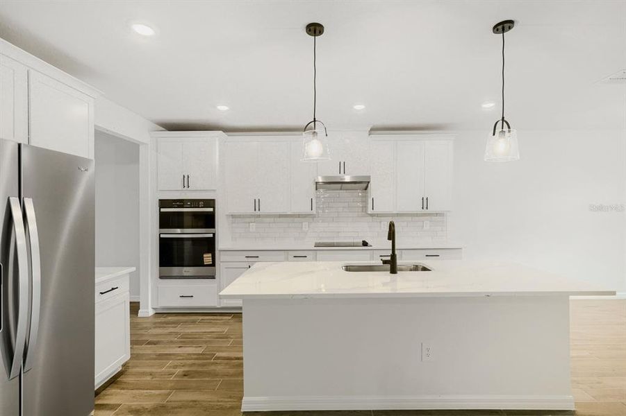 Furnished interior view inside a new home in The Grove at Stuart Crossing - Signature Series, Bartow (Image 12). Furnished interior view inside a new home in The Grove at Stuart Crossing - Signature Series, Bartow (Image 12).