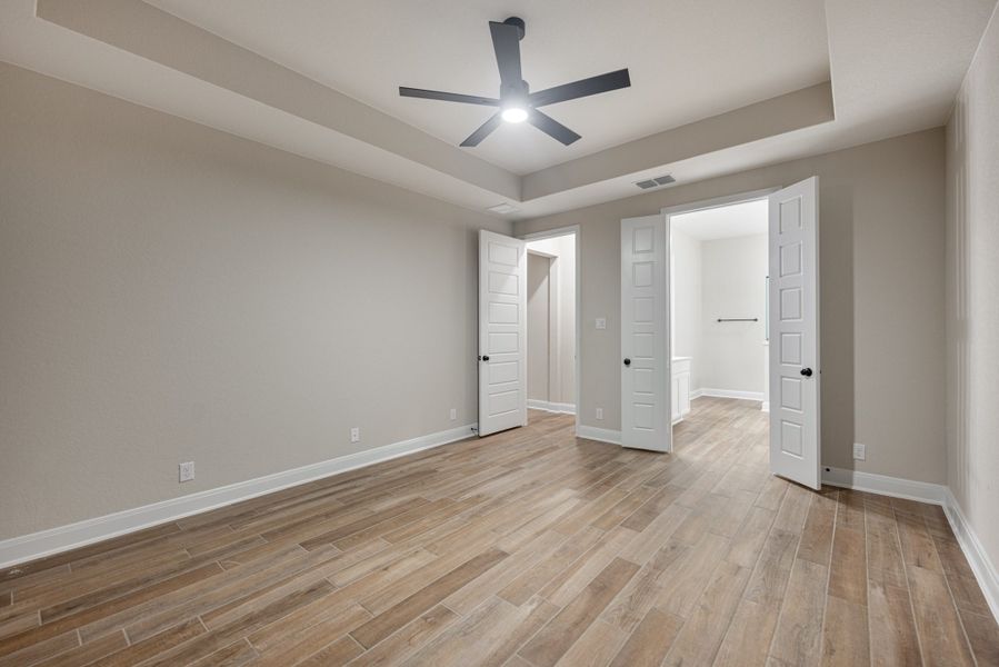 Representative unfurnished interior of a home built from the Mackenzie by Chesmar Homes in Sienna Lakes, San Antonio (Image 23).