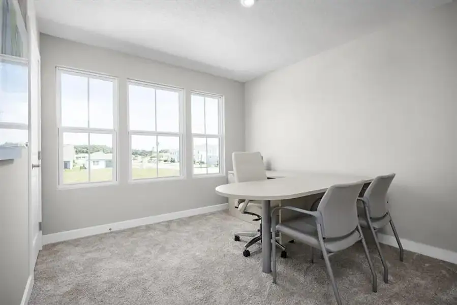 Representative furnished interior of a home built from the Nassau Bay End Home by Ryan Homes in Waverly at Wylder, Port St. Lucie (Image 16).