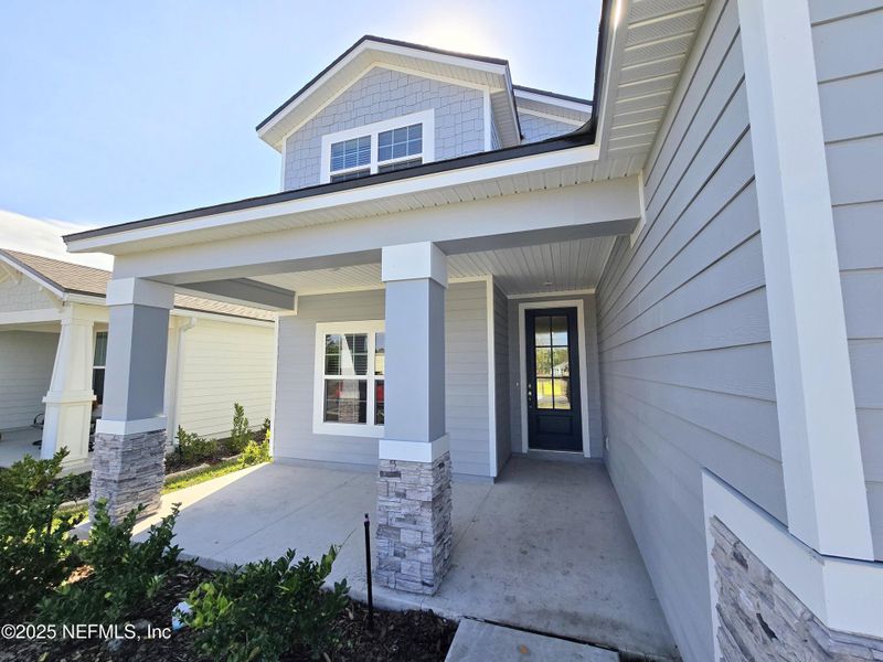 Exterior details and patio area of a home in Hyland Trail, Green Cove Springs (Image 27).