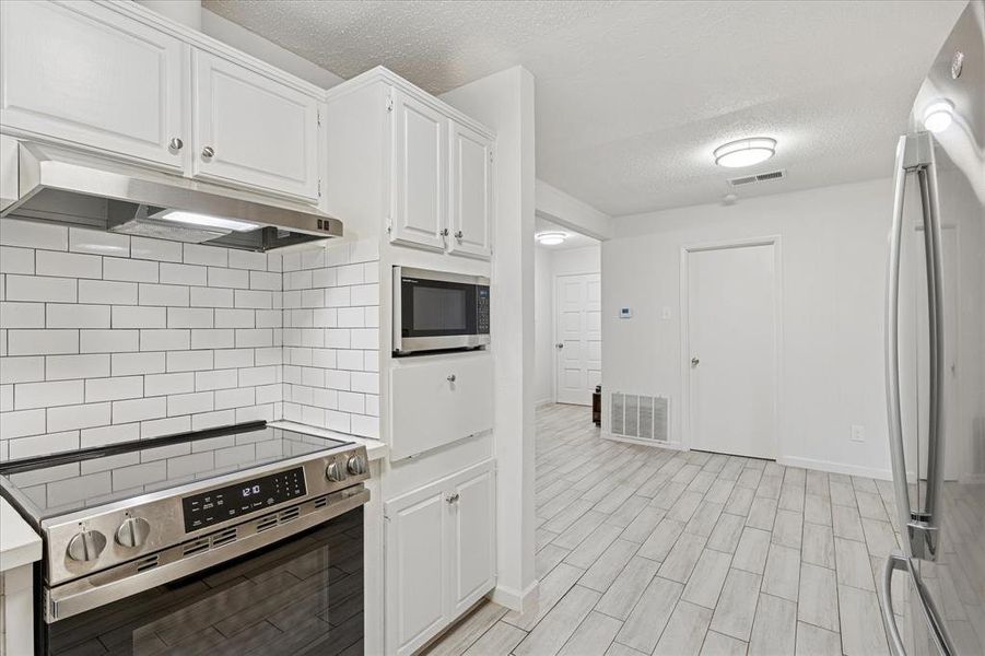 Furnished interior view inside a new home in , Whitney (Image 17).