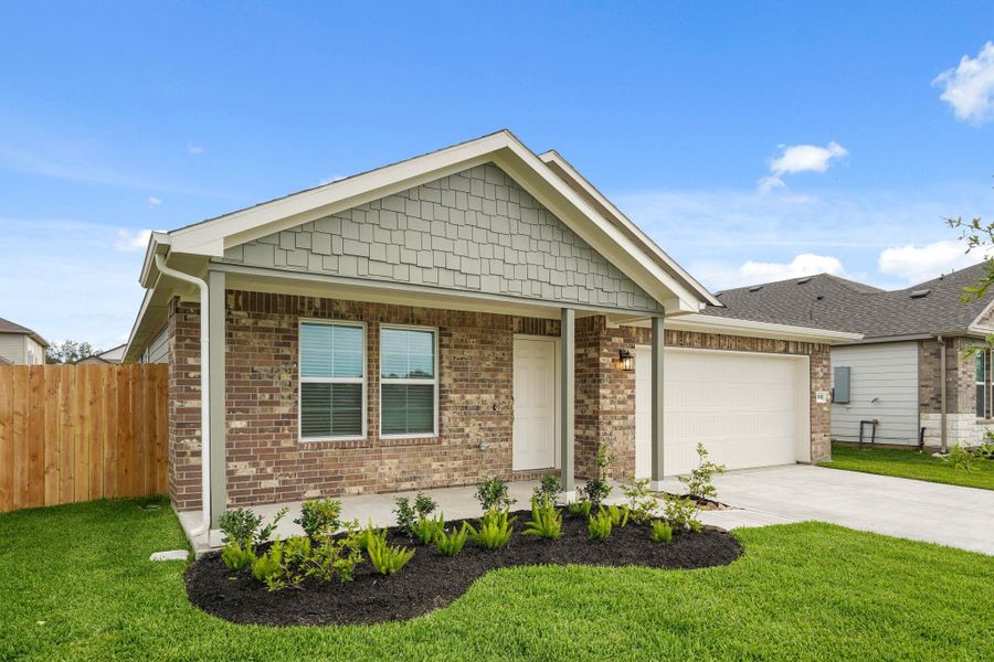 Front exterior of a new home in Valor Park, Bay City, TX, highlighting curb appeal (Image 17). Front exterior of a new home in Valor Park, Bay City, TX, highlighting curb appeal (Image 17).