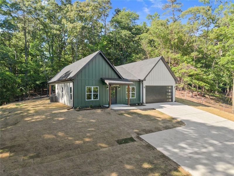 Front exterior of a new home in , Gainesville, GA, highlighting curb appeal (Image 25).