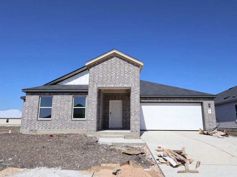 In-progress construction of a new home in Carillon, Manor, TX (Image 11).