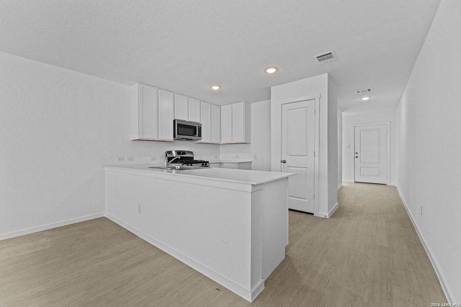 Furnished interior view inside a new home in Waterwheel, San Antonio (Image 7).