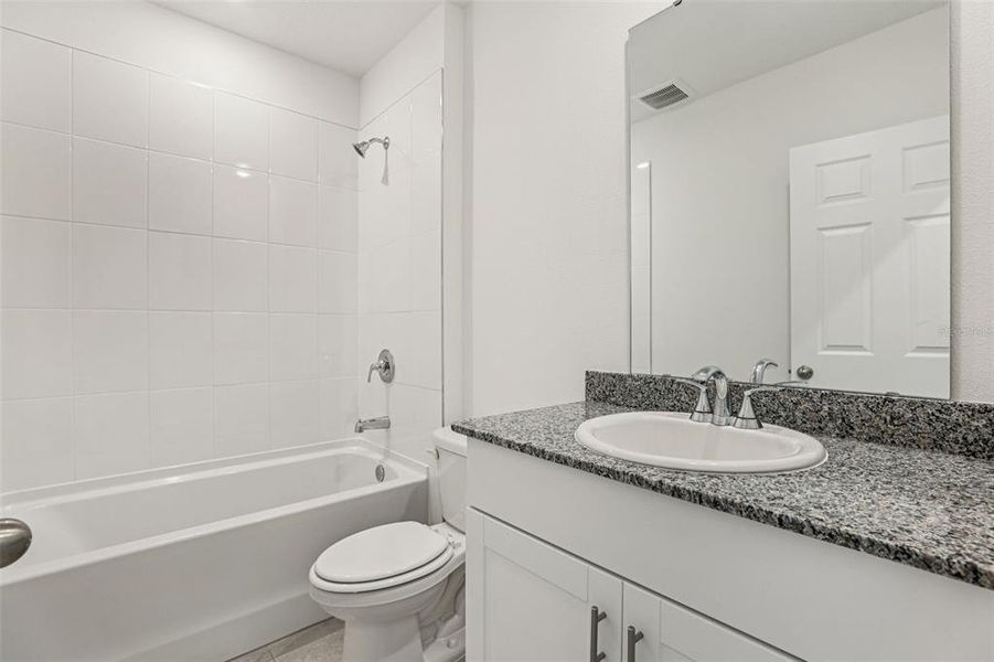 Furnished interior view inside a new home in Lawson Dunes - Signature Series, Haines City (Image 5). Furnished interior view inside a new home in Lawson Dunes - Signature Series, Haines City (Image 5).