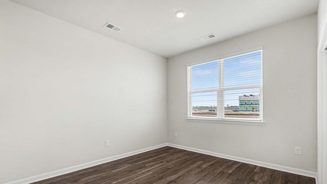 Spacious, unfurnished interior of a new home in Auberon Woods, Conway (Image 10).