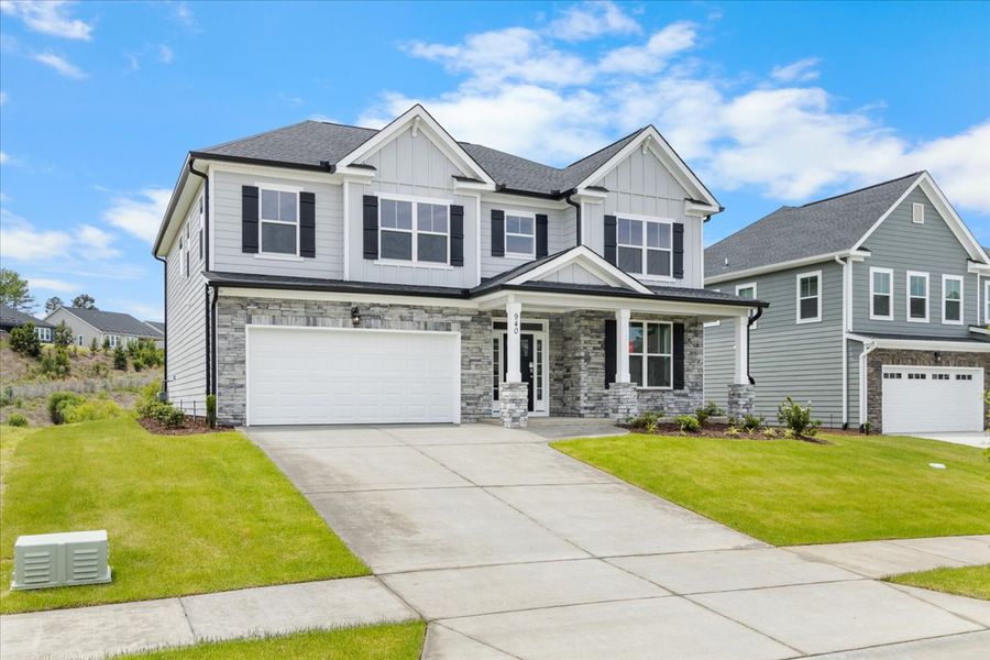 Front exterior of a new home in Crawford Creek, Grovetown, GA, highlighting curb appeal (Image 28). Front exterior of a new home in Crawford Creek, Grovetown, GA, highlighting curb appeal (Image 28).