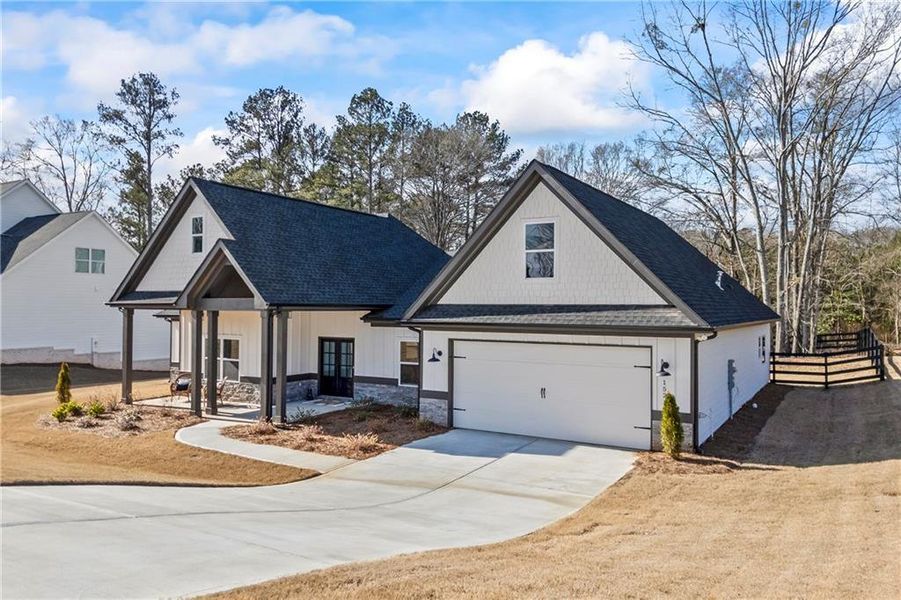Front exterior of a new home in , Monroe, GA, highlighting curb appeal (Image 27).