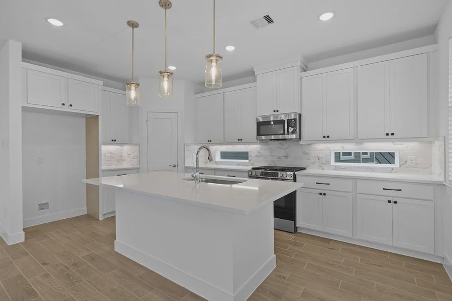 Furnished interior view inside a new home in Elyson Courtyard Collection, Katy (Image 8).
