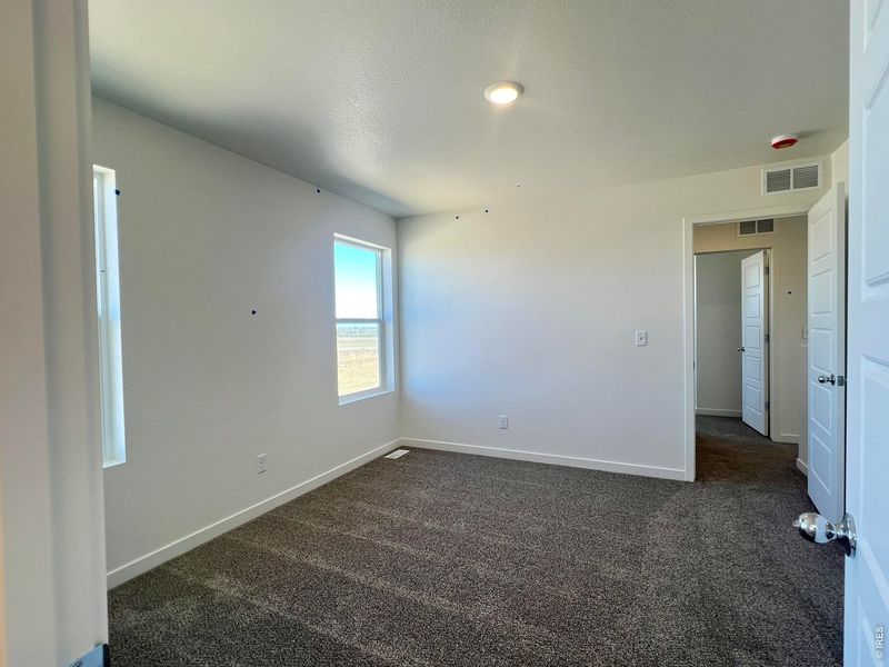 Spacious, unfurnished interior of a new home in Union Colony West, Greeley (Image 16).