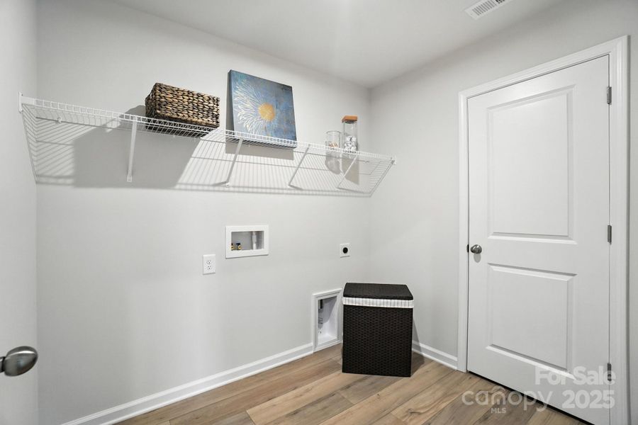 Furnished interior view inside a new home in Waxhaw Landing, Monroe (Image 12).