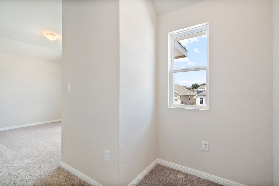 Image 57 representing the Blake by Ashton Woods in Rolling Glen, Hutto, TX.